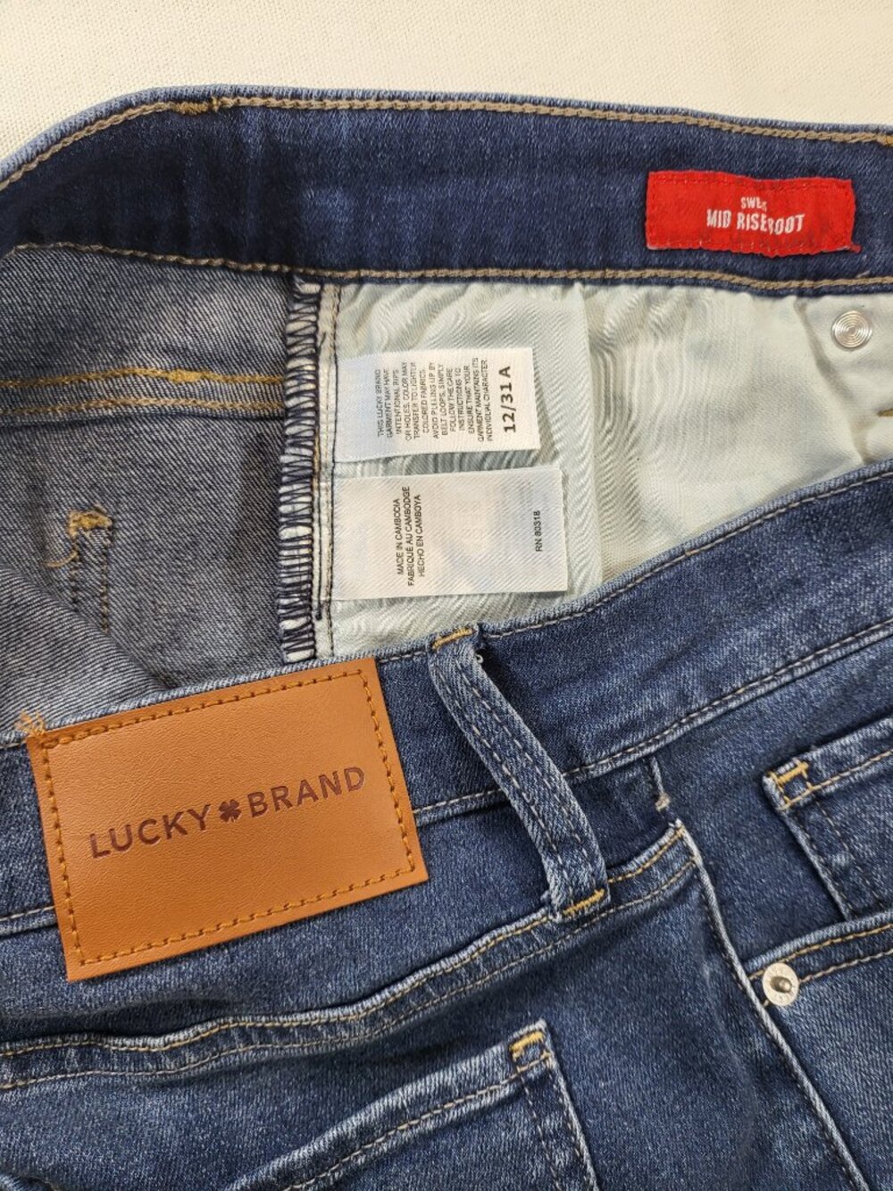 Lucky Brand Mid Rise Sweet Bootcut Jeans Raw Hem Blue Denim Size 12 - Picture 9 of 9